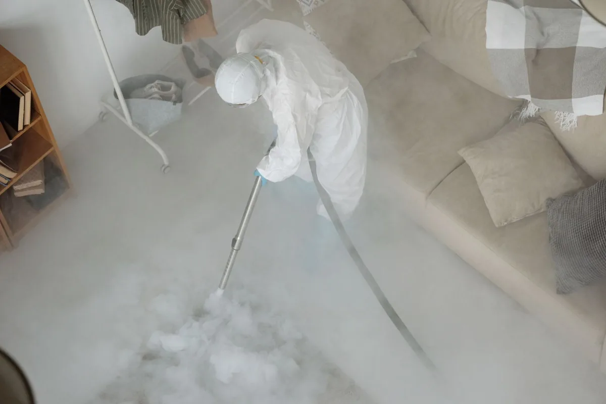 Biohazard cleanup technician in protective equipment, Pine Brook, NJ